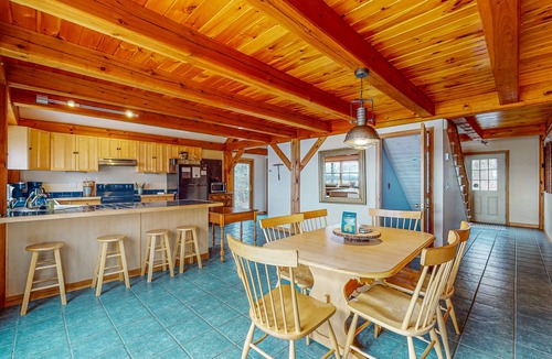 Greenville Junction House | Spectacular lakefront home with dock, firepit, & vaulted ceilings - dog-friendly