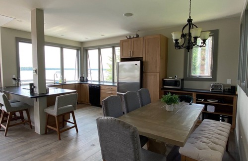 Alburg House | Spectacular Lakefront Home With Patio, Fire Pit, Large Dock and Work Booth.