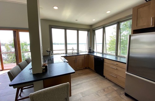 Alburg House | Spectacular Lakefront Home With Patio, Fire Pit, Large Dock and Work Booth.