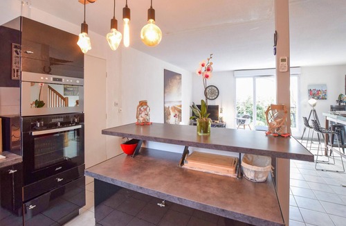 Touques House | Spend a wonderful family vacation in this vacation home with pool access.