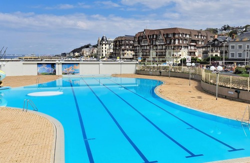 Touques House | Spend a wonderful family vacation in this vacation home with pool access.