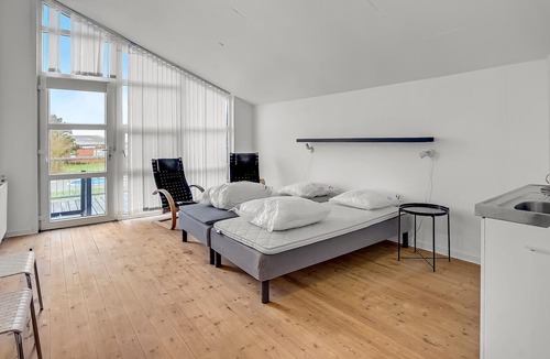 Emmerlev Apartment | Spend an unforgettable vacation in this spacious apartment by the sea.