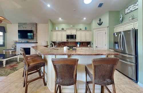 Palm Harbor Cottage | Splashing Dolphins by Distinctive Beach Rentals