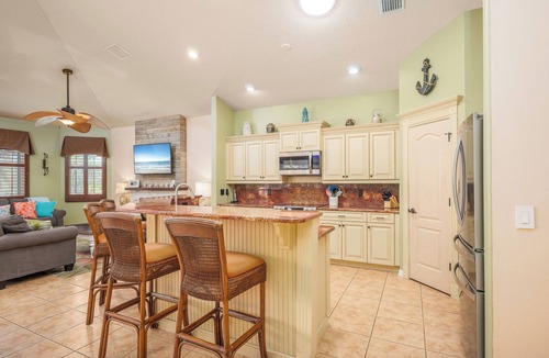 Palm Harbor Cottage | Splashing Dolphins by Distinctive Beach Rentals