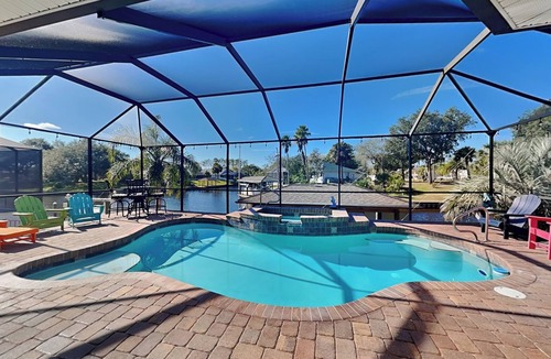 Palm Harbor Cottage | Splashing Dolphins by Distinctive Beach Rentals