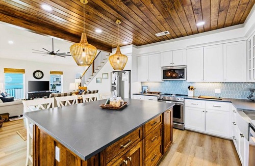 Pointe San Luis House | Spoonbill at West Bay
