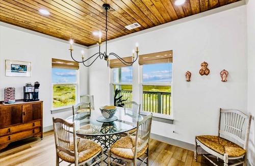 Pointe San Luis House | Spoonbill at West Bay