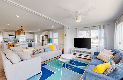 Prime Hook Beach House | Sprawling beachfront home with alfresco dining, grill, games, W/D, & open layout