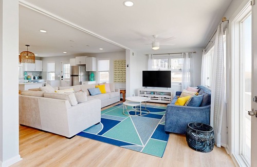 Prime Hook Beach House | Sprawling beachfront home with alfresco dining, grill, games, W/D, & open layout