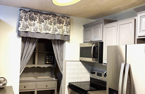 Wears Valley Cabin | Spring has Sprung! Cozy up by the fireplace in this Cabin in the Heart of Nature