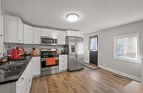 North End House | St. Paul Family Getaway: 3BR House with Backyard