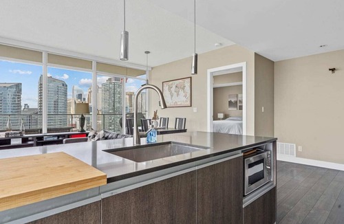 Victoria Park Condo | Stampede Fireworks View! 2BD 2BA Parking, AC