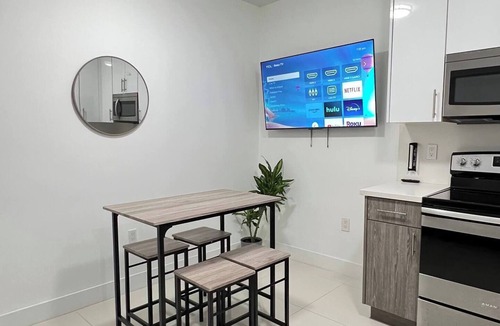 Liberty City Apartment | Stanza Design District Parking Laundry