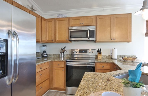 Bradenton Beach Condo | Starfish Unit B - Heated Shared Pool, Sunsets, Private Elevator & Rooftop Deck!