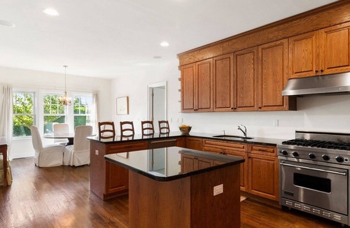 Tuckahoe House | Stately traditional home with open floorplan and private pool in coveted.