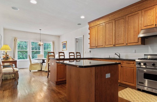 Tuckahoe House | Stately traditional home with open floorplan and private pool in coveted.