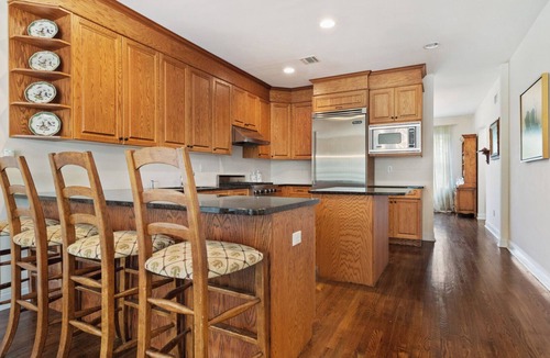 Tuckahoe House | Stately traditional home with open floorplan and private pool in coveted.