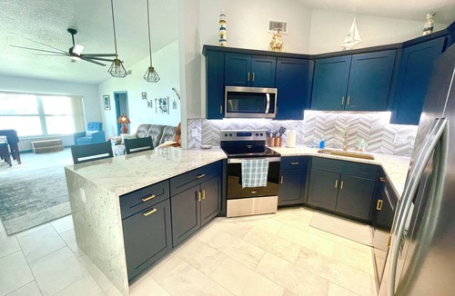 Cocoa Beach Condo | Stay and kayak with dolphins manatees
