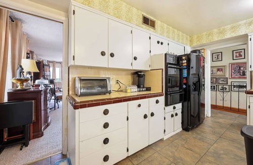 Oak Park House | Stay at Grandmas Entire Home with Yard & Balcony