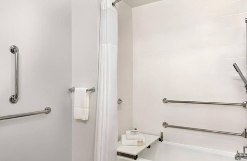 Suwanee House | Stay Awesome in Our Spacious Room! Pets Allowed