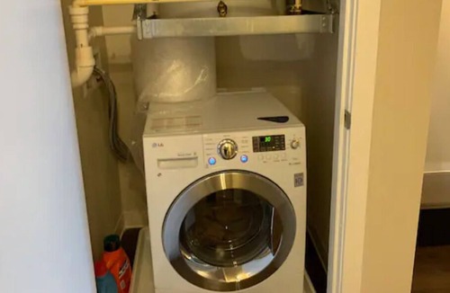 Inner Harbor Condo | Stay in Downtowns 1st Skyscraper w/ Pool table & Gym