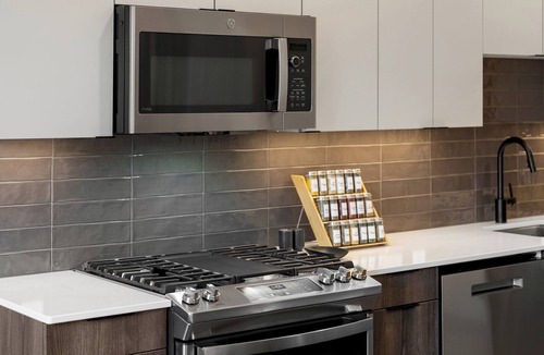 Everett Apartment | Sterling 1BR at Everett | Pool & Gym