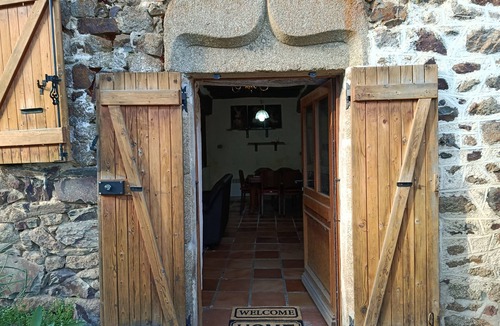 Saint-Fraimbault-de-Prieres Cottage | Stone house with lake view, fireplace, surrounding grassland