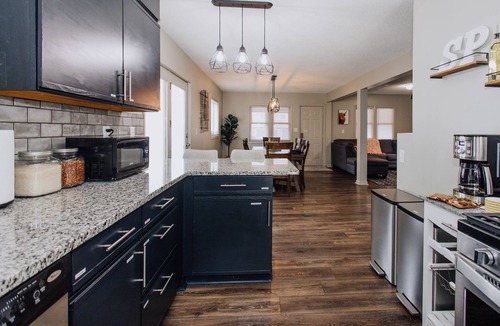 Macalester - Groveland House | Stocked Kitch. & Coffee Bar 65" TV Close 2 Macalester College