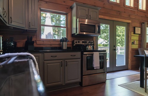 Sterling Cabin | Stone Beach Access | Cabin with a Fire Pit Glow