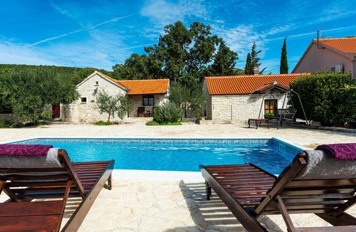 Benkovac Ski Chalet | Stone country House Irena with pool on a large property