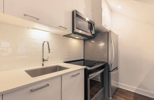Chinatown Apartment | Stone Loft 3BR Downtown Montreal