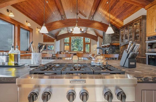 Lake Forest House | Stone Peak Lodge with a Pool Table, Hot Tub, Firepit and Gorgeous Wood and Stonework
