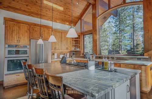 Lake Forest House | Stone Peak Lodge with a Pool Table, Hot Tub, Firepit and Gorgeous Wood and Stonework