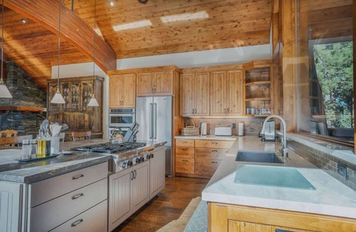 Lake Forest House | Stone Peak Lodge with a Pool Table, Hot Tub, Firepit and Gorgeous Wood and Stonework