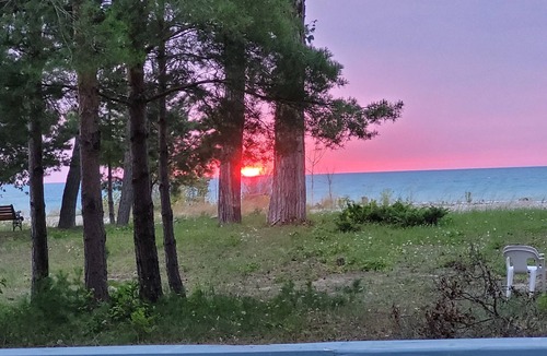 Kincardine Cottage | Stoney Island Sunsets. Blue Nugget is located on the sandy shores of Lake Huron.