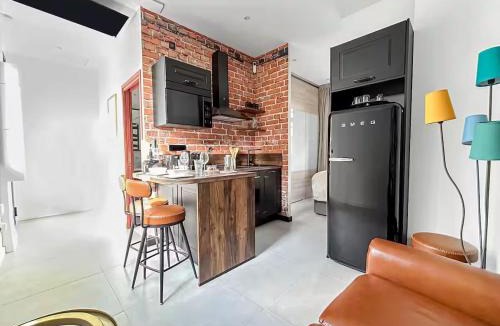 Quartier des Eaux-Claires Apartment | Studio 102 - Premium, Climatisation, Garage