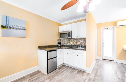 Surf City Apartment | Studio condo with ocean views, pool, deck, & central AC