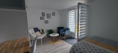 Ecouflant Apartment | Studio cosy