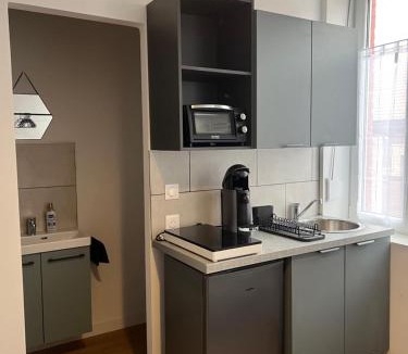 Roubaix Apartment | Studio cosy industriel