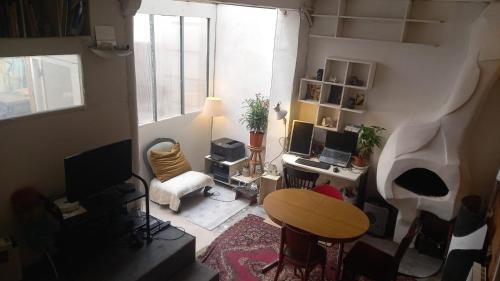 Quartier Sainte-Avoye Apartment | Studio dans un atelier d'artiste