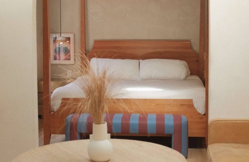 Crossroads Arts District Hotel | Studio Four · Courtyard Canopy Retreat