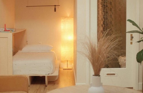 Crossroads Arts District Hotel | Studio Four · Courtyard Canopy Retreat