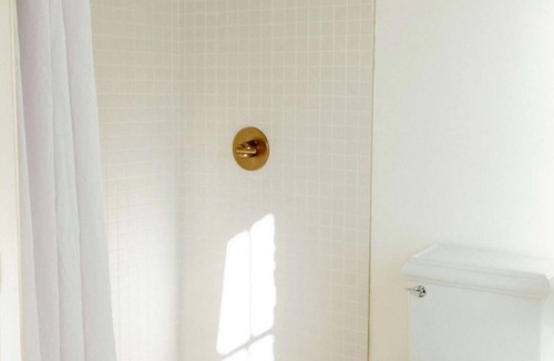 Crossroads Arts District Hotel | Studio Four · Courtyard Canopy Retreat