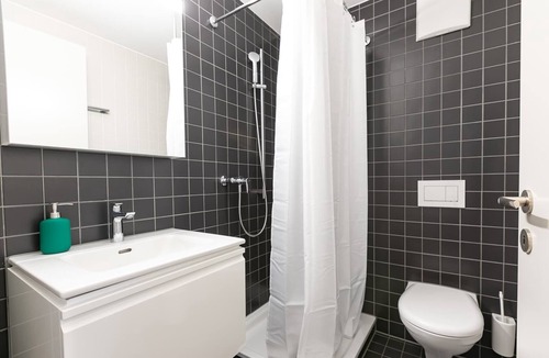 St. Gallen Apartment | Studio modern red (3) with shower (plus kitchen for shared use)