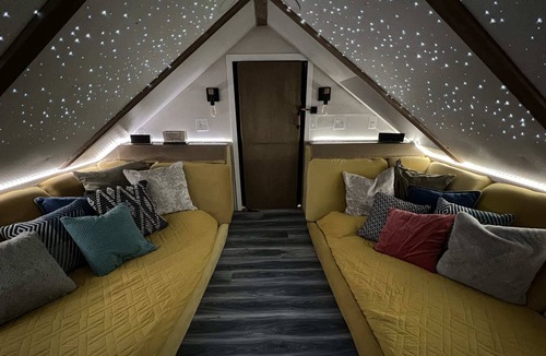 Buechel Apartment | Studio suite with secret movie room! Sleeps 4.