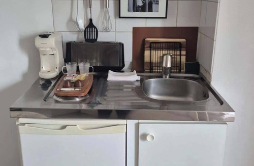 Quartier de Rochechouart Apartment | Studio Under the Rooftops - Sacre-Coeur View