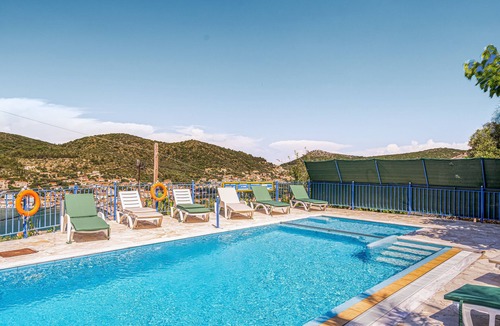 Vathy Apartment | Studio 'Veronis 2' with Sea View, Shared Pool & Wi-Fi