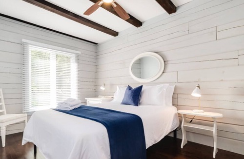 Pontiac House | Stunning waterfront getaway w/ hot tub, sleeps 10!