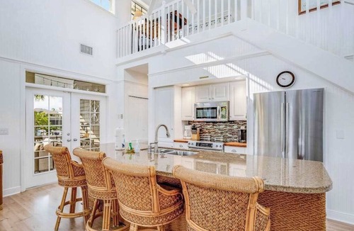 Bokeelia House | Stunning canal-front home with pools, AC, W/D & hammock