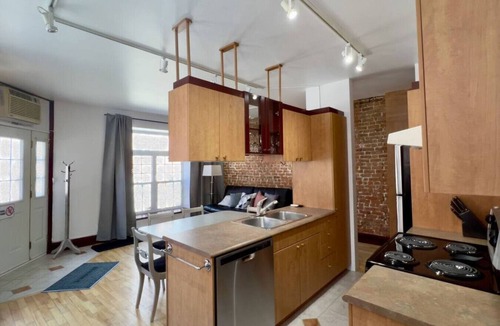 Saint-Jean-Baptiste Condo | Stunning condo in an old grocery store